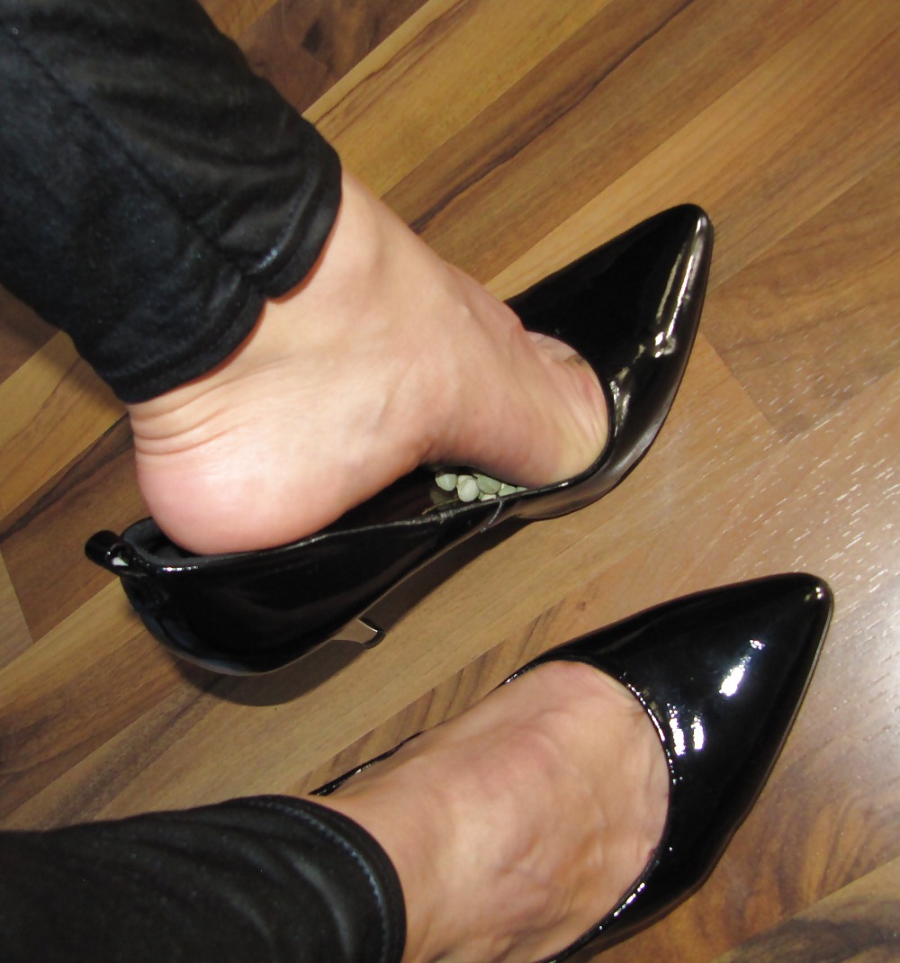 Foot torture with peas in high heels, leggings and corset #21593832