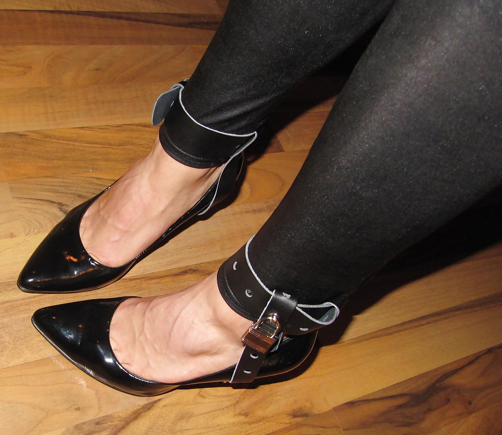 Foot torture with peas in high heels, leggings and corset #21593858