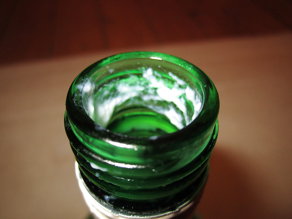 A bottle inserted in to my moist pussy