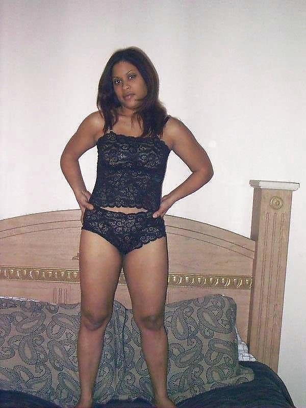 Indian woman strips and poses in hotel room  #15821539