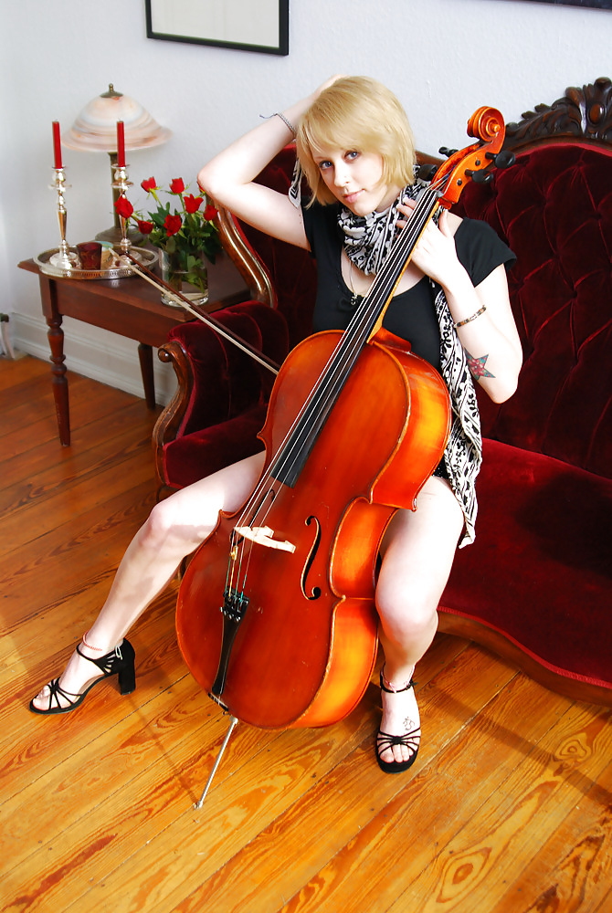 Pretty blond german with blue eyes and a Cello #14670718