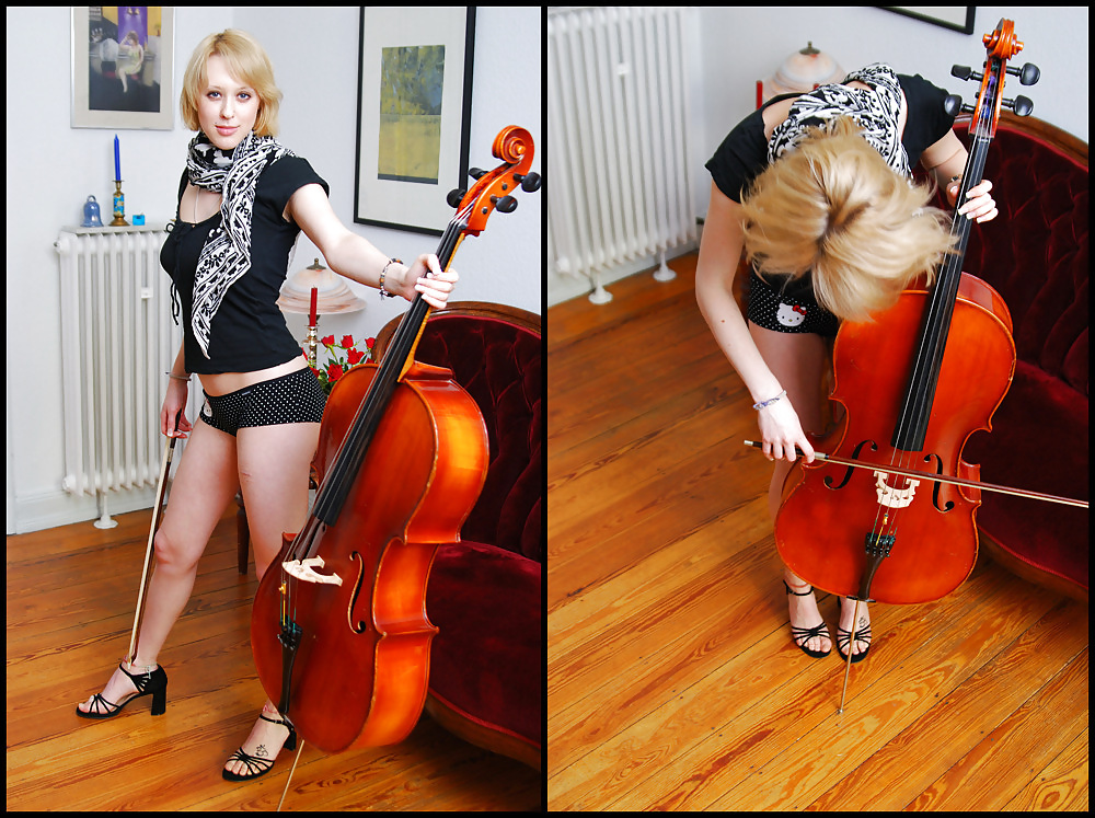 Pretty blond german with blue eyes and a Cello #14670749