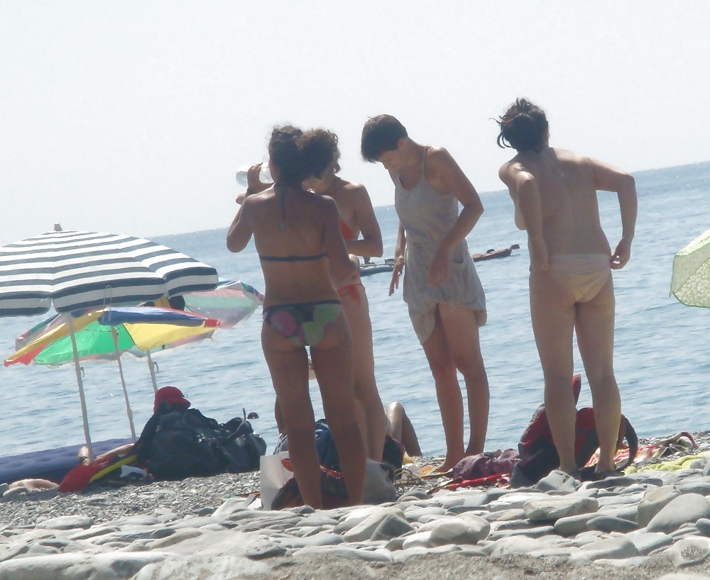 Beach stripping Getting nude at beach Undressing beach #18202230