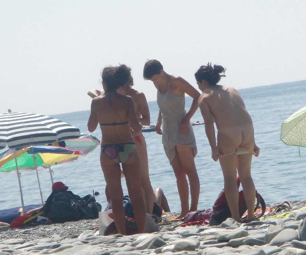 Beach stripping Getting nude at beach Undressing beach #18202231