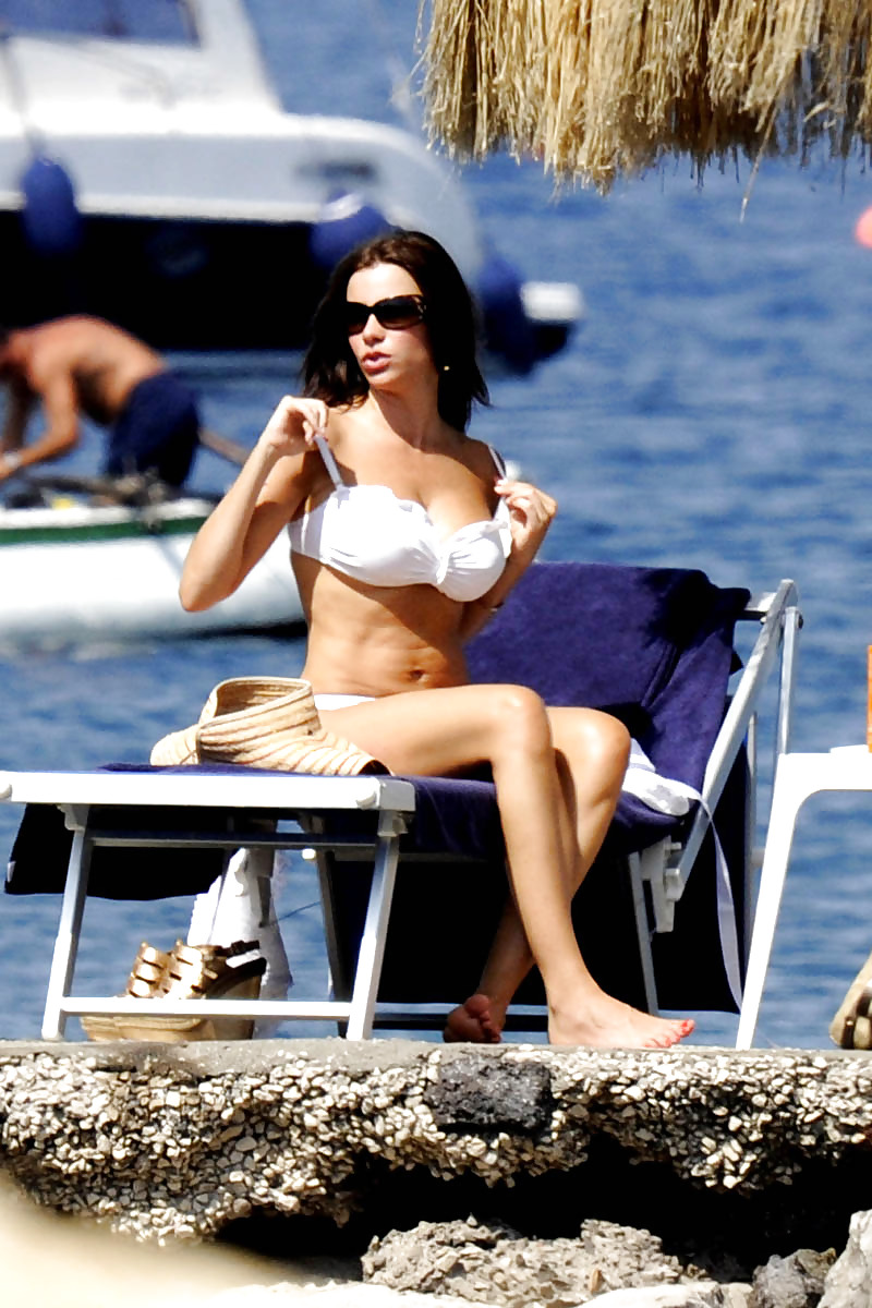 Sofia Vergara showing huge ass & cleavage in a white bikini #4026412
