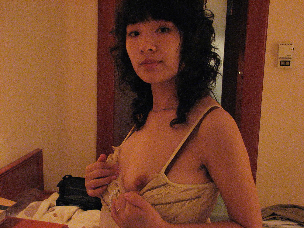 Chinese housewife with bushy armpits #20326313