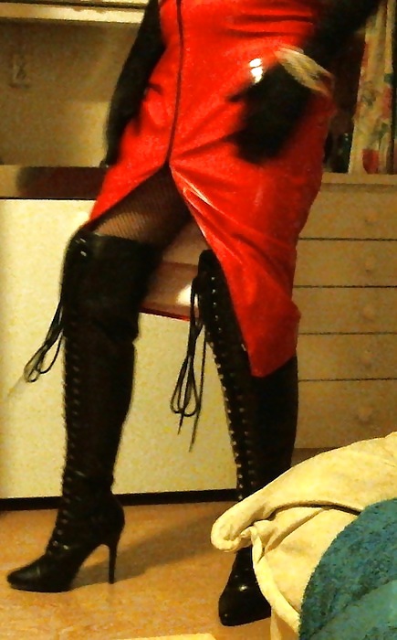 Me crossdressing in shiny red skirt & black lace up boots #22169563