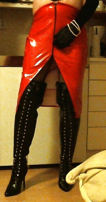 Me crossdressing in shiny red skirt & black lace up boots #22169566