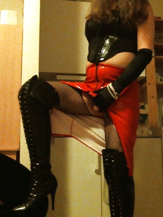 Me crossdressing in shiny red skirt & black lace up boots #22169569