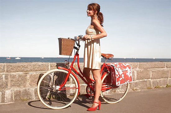 Babes riding bicyles in high heels  #11900024