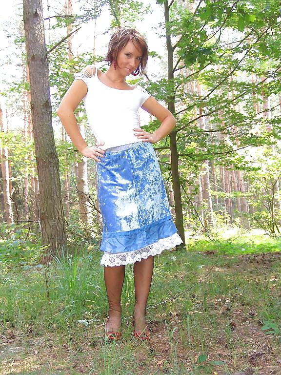 Kelly Dee in blue skirt black stockings and heels outdoors #4122518