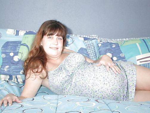 Pregnant brunette posing her plump body #16446103