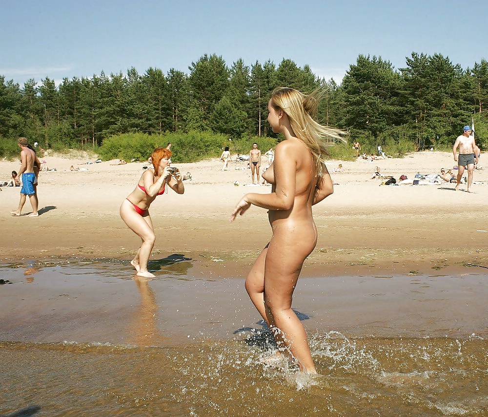 Naked blonde on the beach #1243166