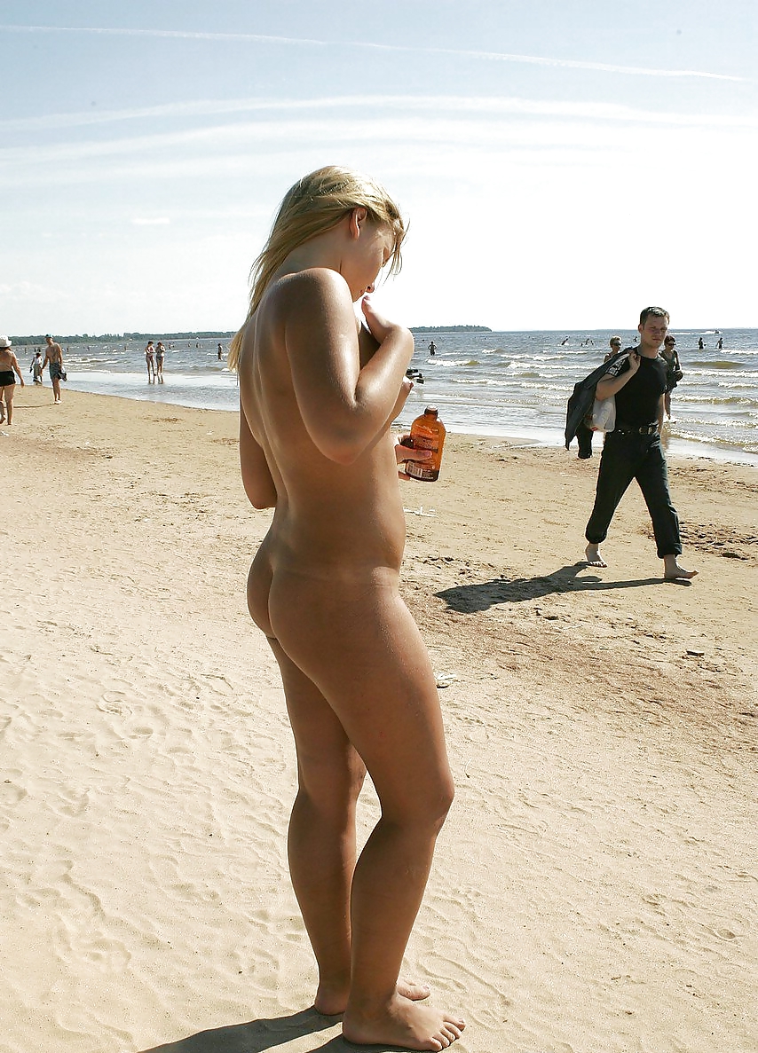 Naked blonde on the beach #1243204