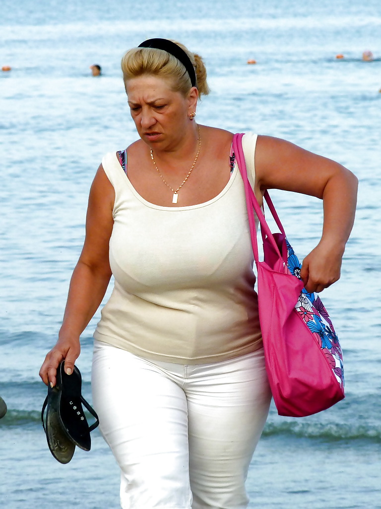 Russian woman with big boobs on the beach! picture