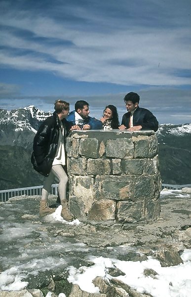 Two girls and two guys having fun in the Alps #9339941