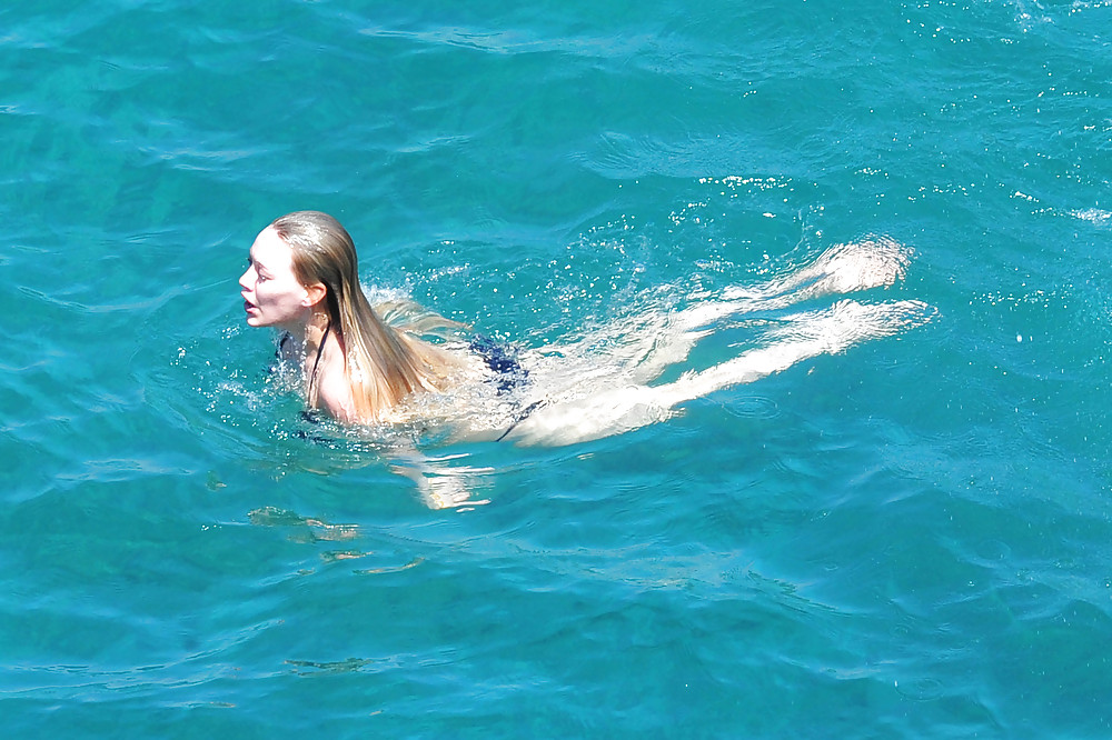 Hilary Duff wearing a bikini in Italy #7314025