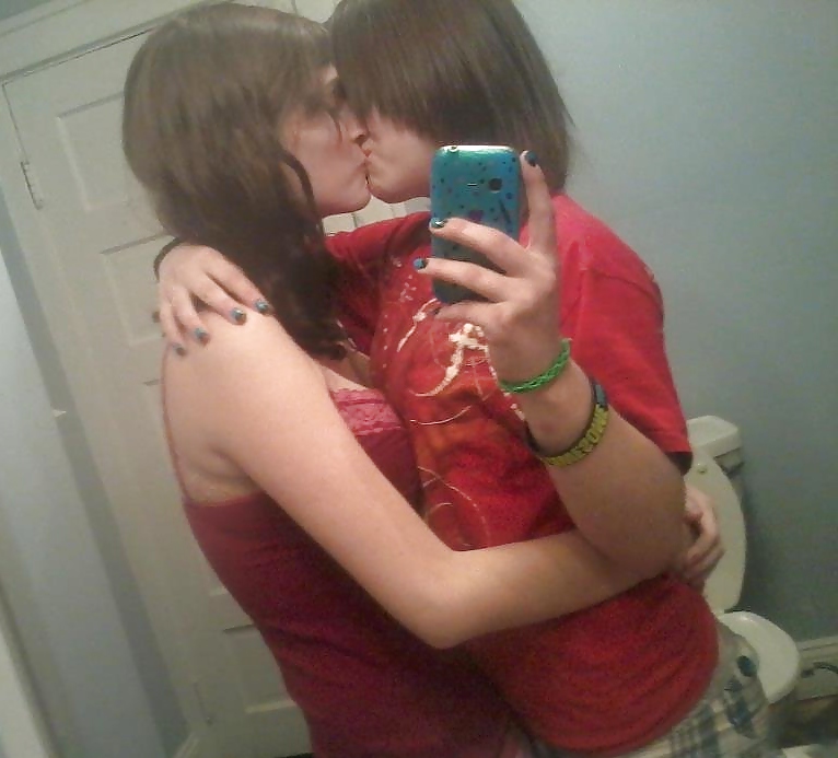 Teen lesbians kiss  #18147182