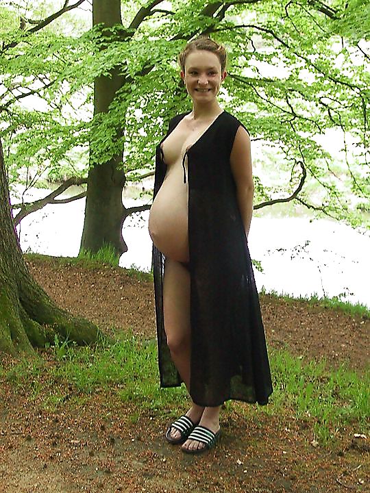 Cute pregger taking a walk in the forest #18724806