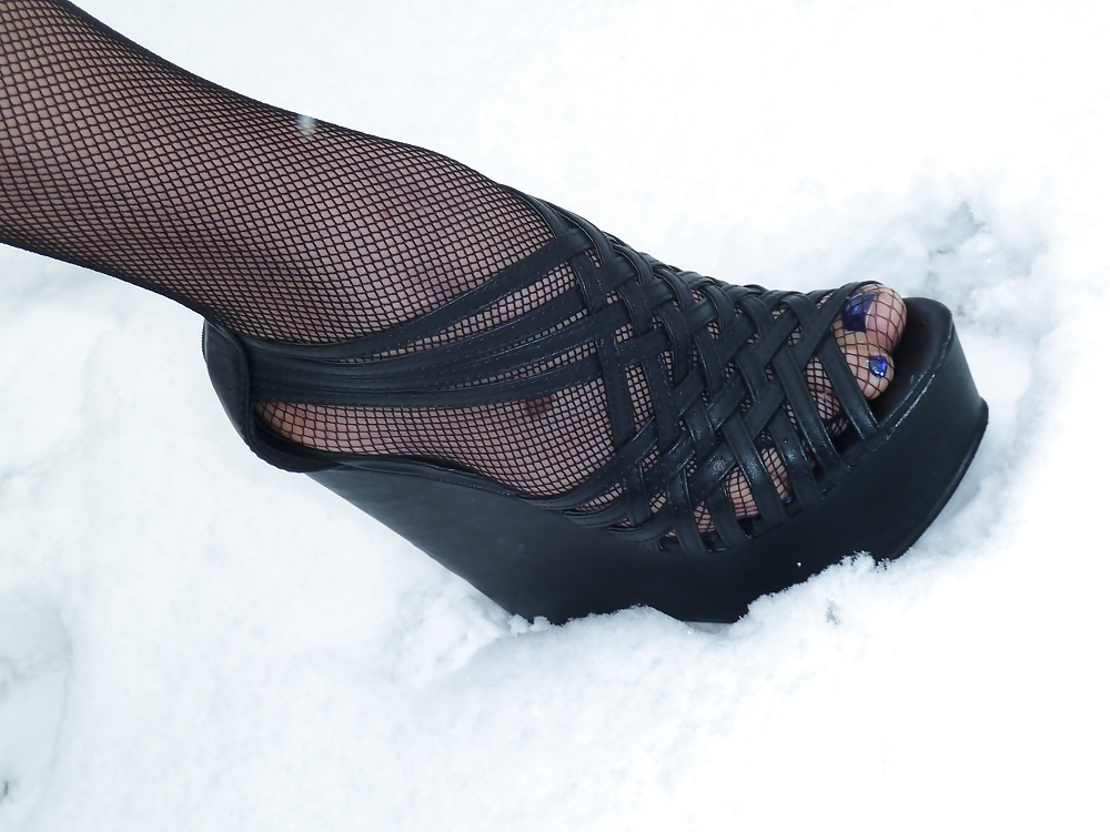 Babysitter feet in snow #15104308
