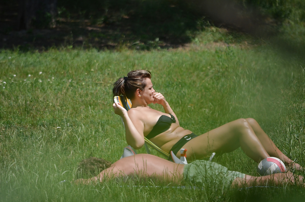Girl sunbathing in the park I #11339294