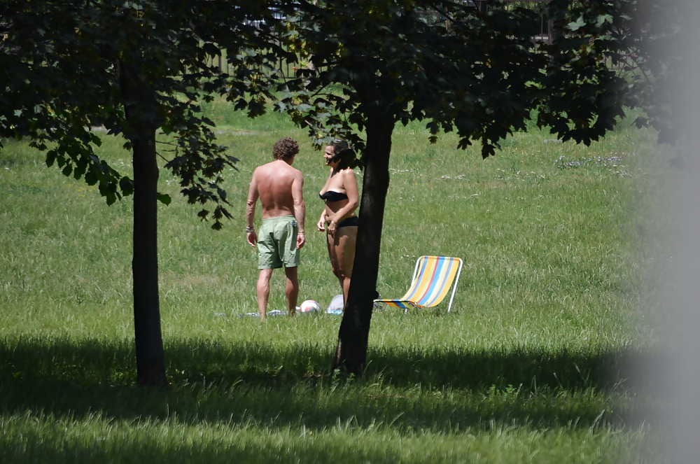 Girl sunbathing in the park I #11339397