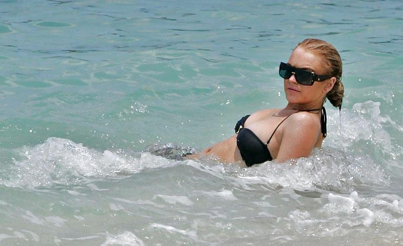 Lindsay Lohan ... Nipple In Black Bikini #10587445
