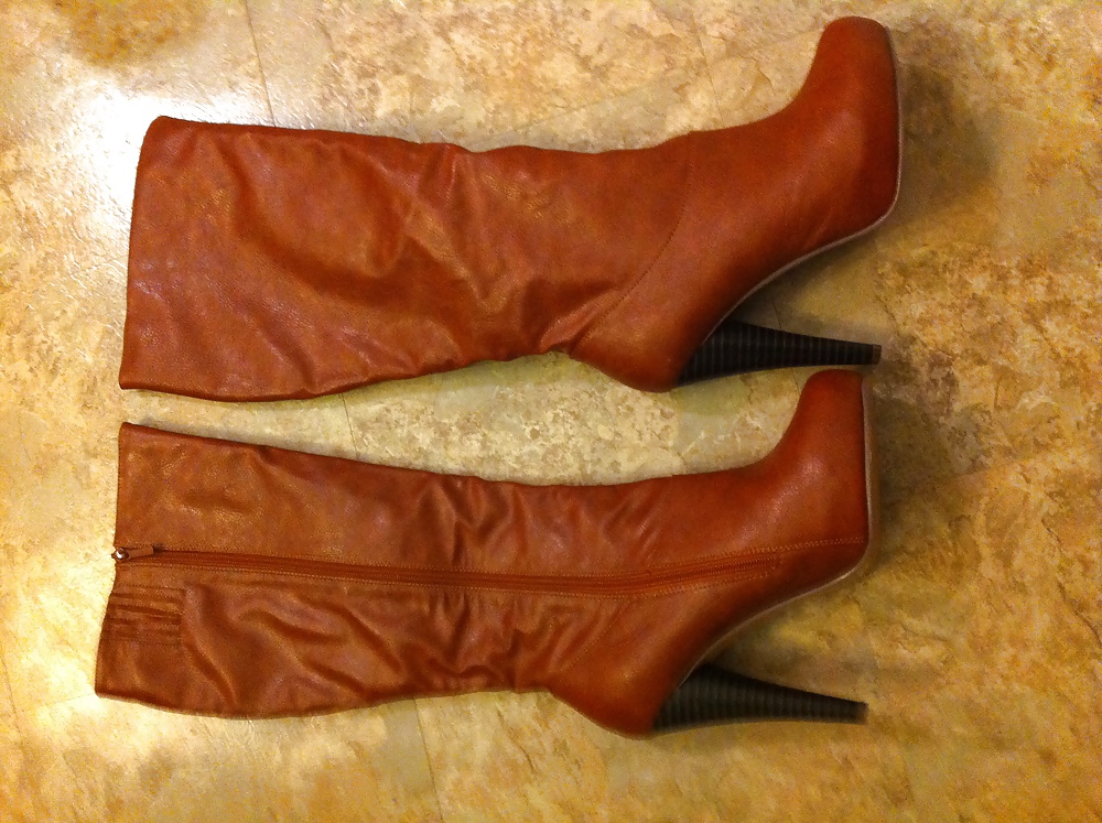 Brown leather knee high boots #14672937