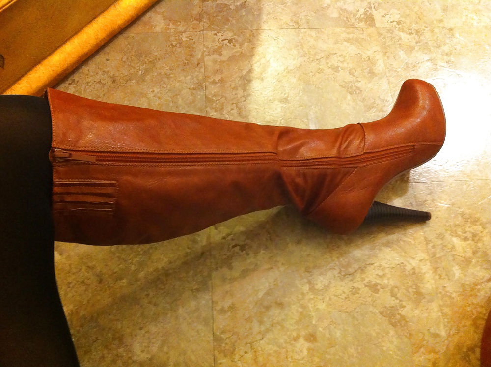 Brown leather knee high boots #14672946