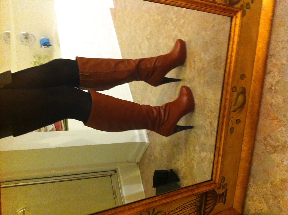 Brown leather knee high boots #14672960