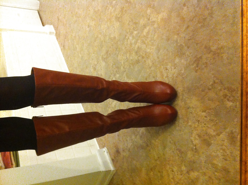 Brown leather knee high boots #14672965