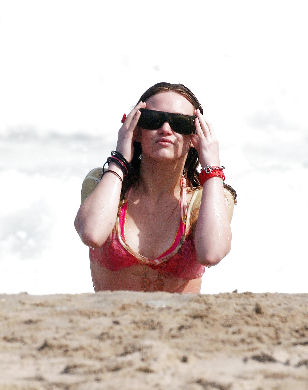 Hilary Duff at the Beach playing around in a wet shirt #7220841