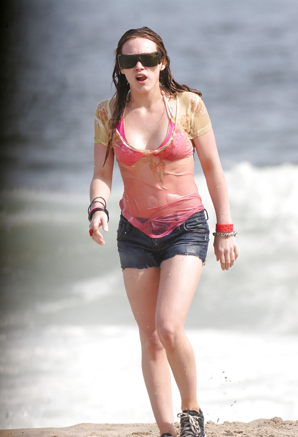 Hilary Duff at the Beach playing around in a wet shirt #7220896