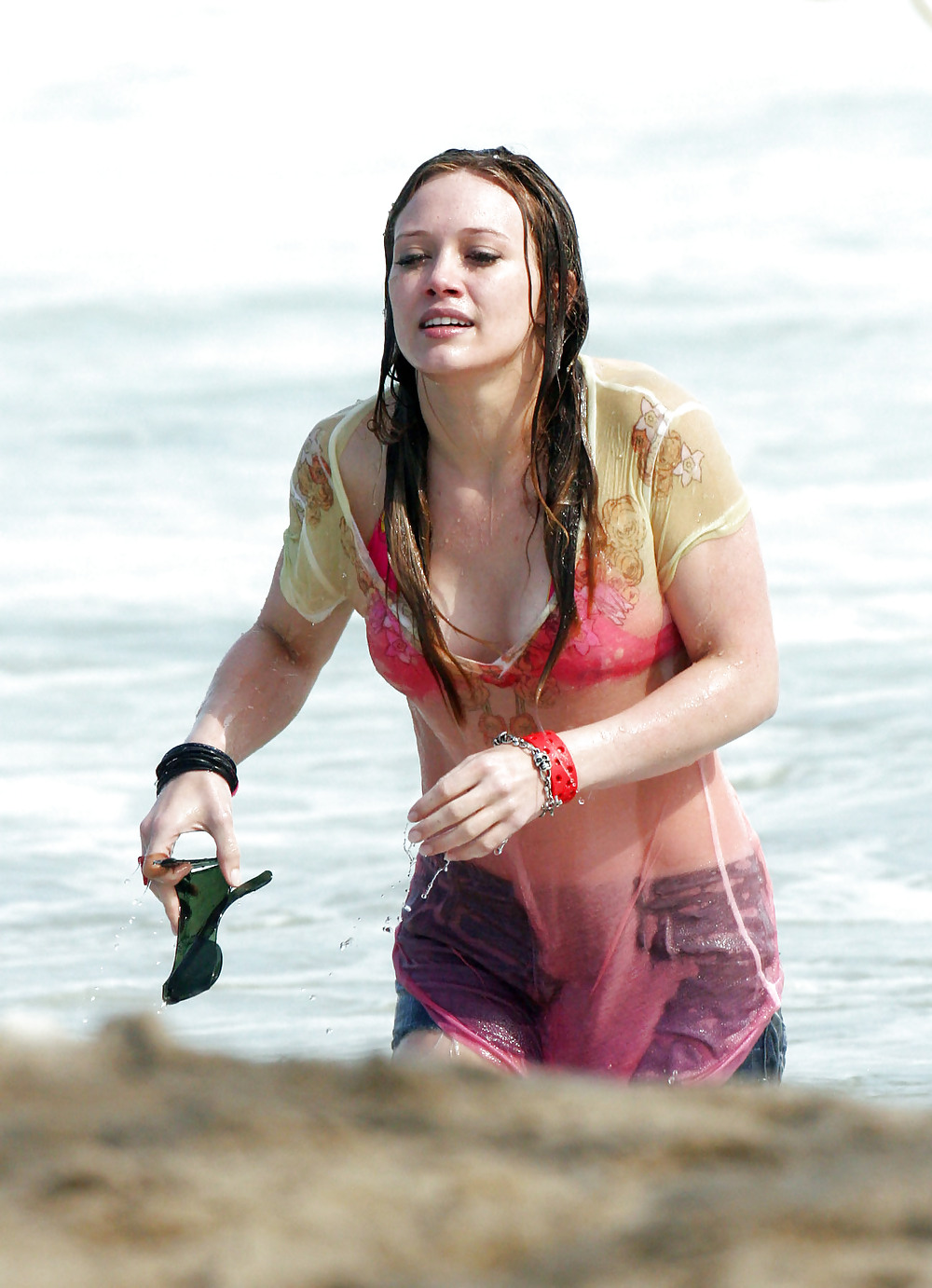 Hilary Duff at the Beach playing around in a wet shirt #7220939