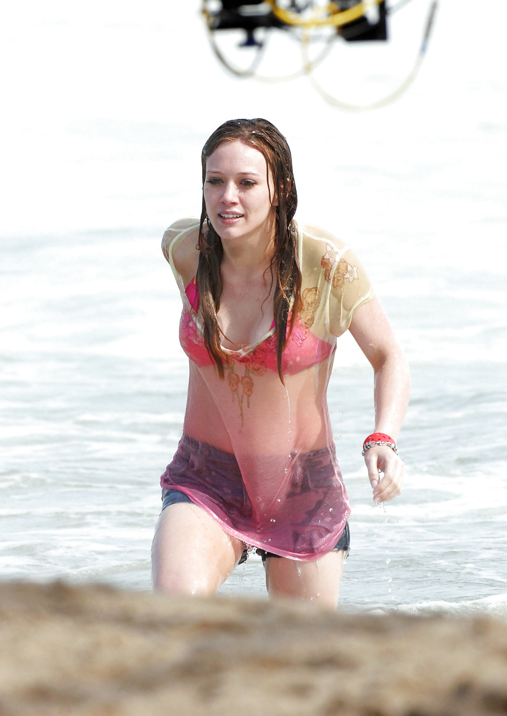 Hilary Duff at the Beach playing around in a wet shirt #7221009