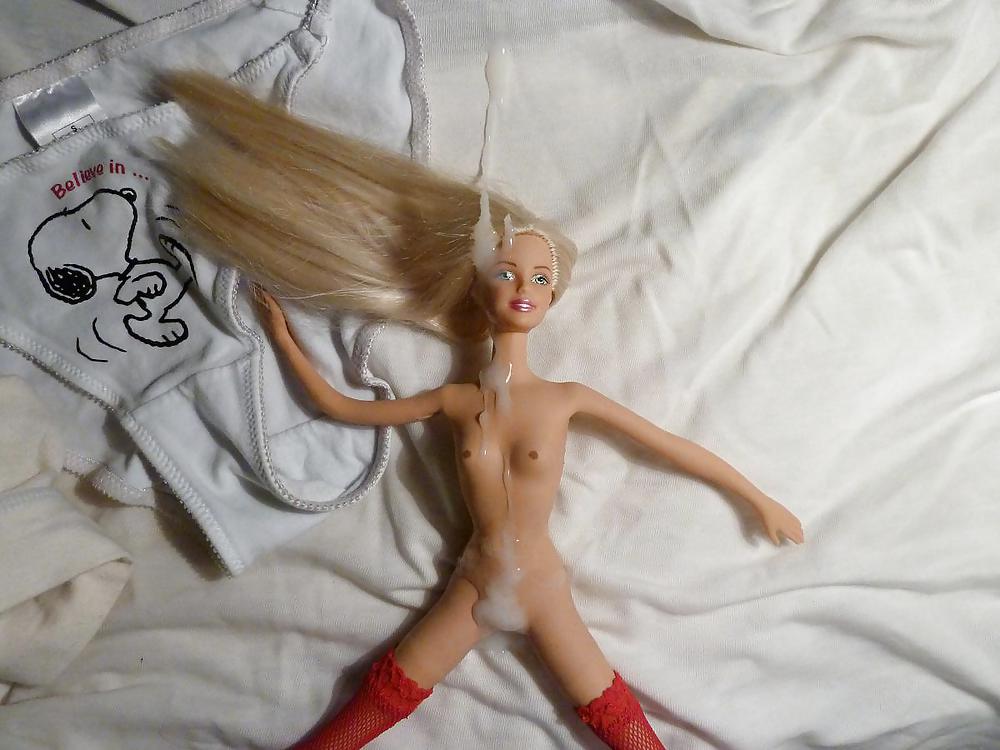 Cumshot on a Barbie doll