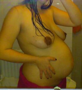 Pregnant belly and big tits