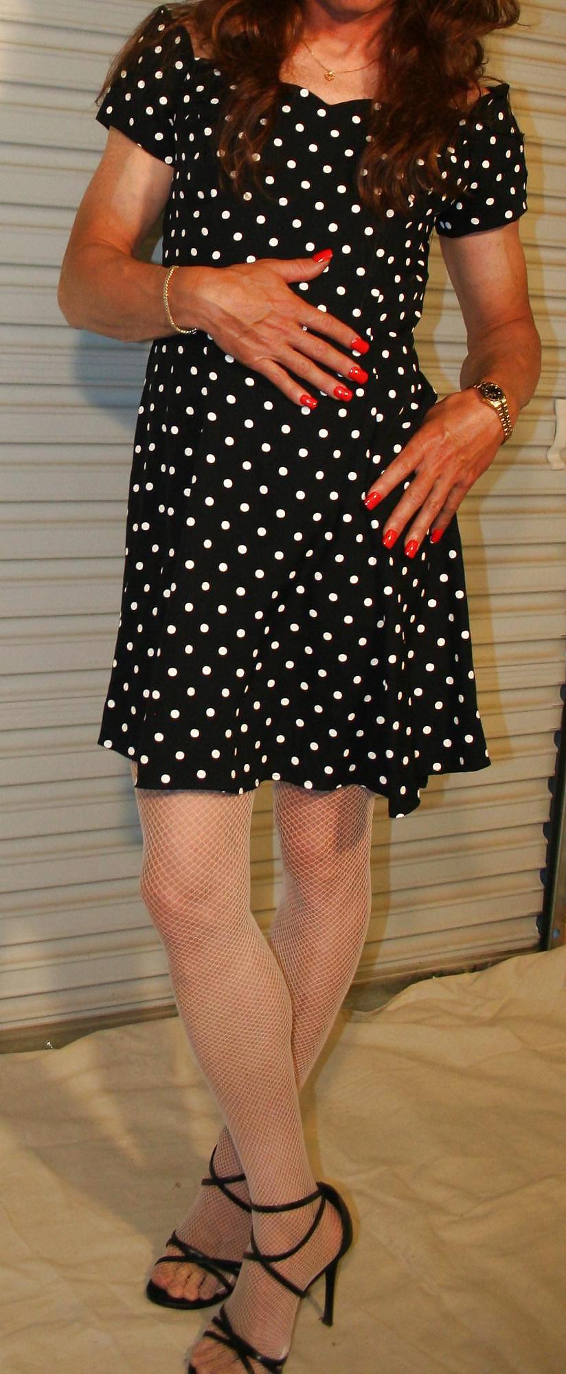 Brianna in a black and white polka dot dress. #21052590