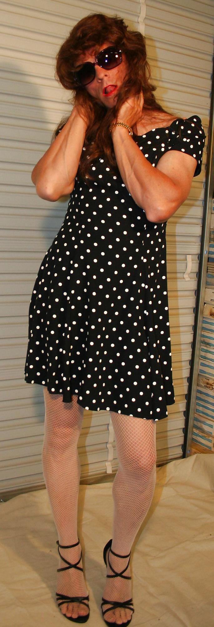 Brianna in a black and white polka dot dress. #21052607