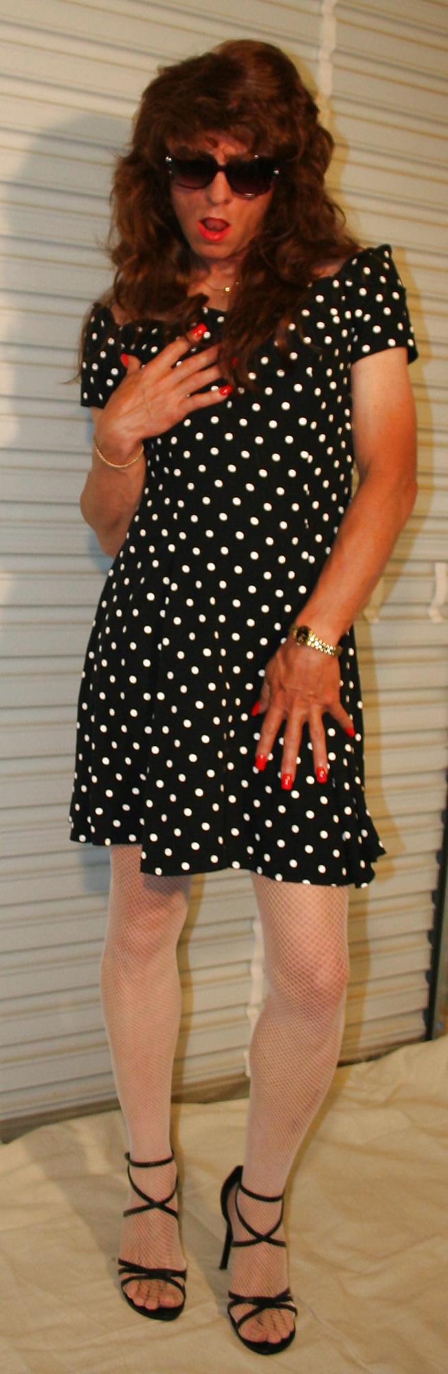 Brianna in a black and white polka dot dress. #21052612