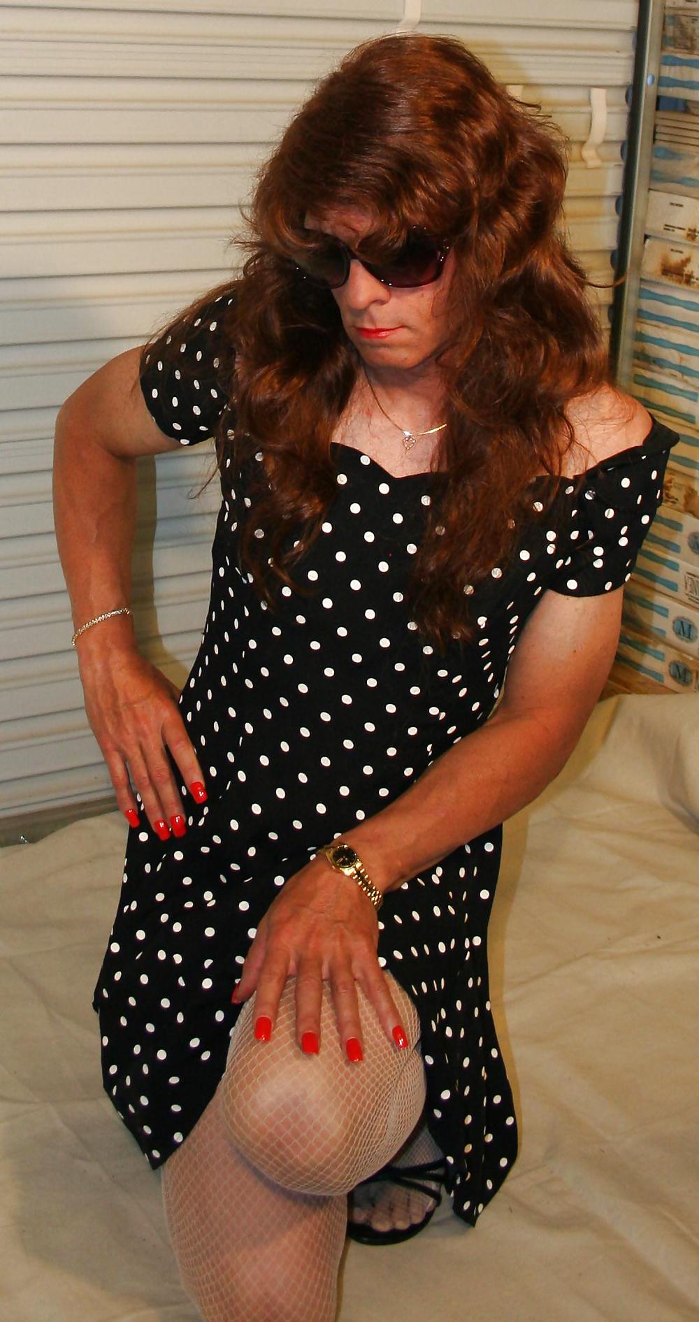 Brianna in a black and white polka dot dress. #21052637