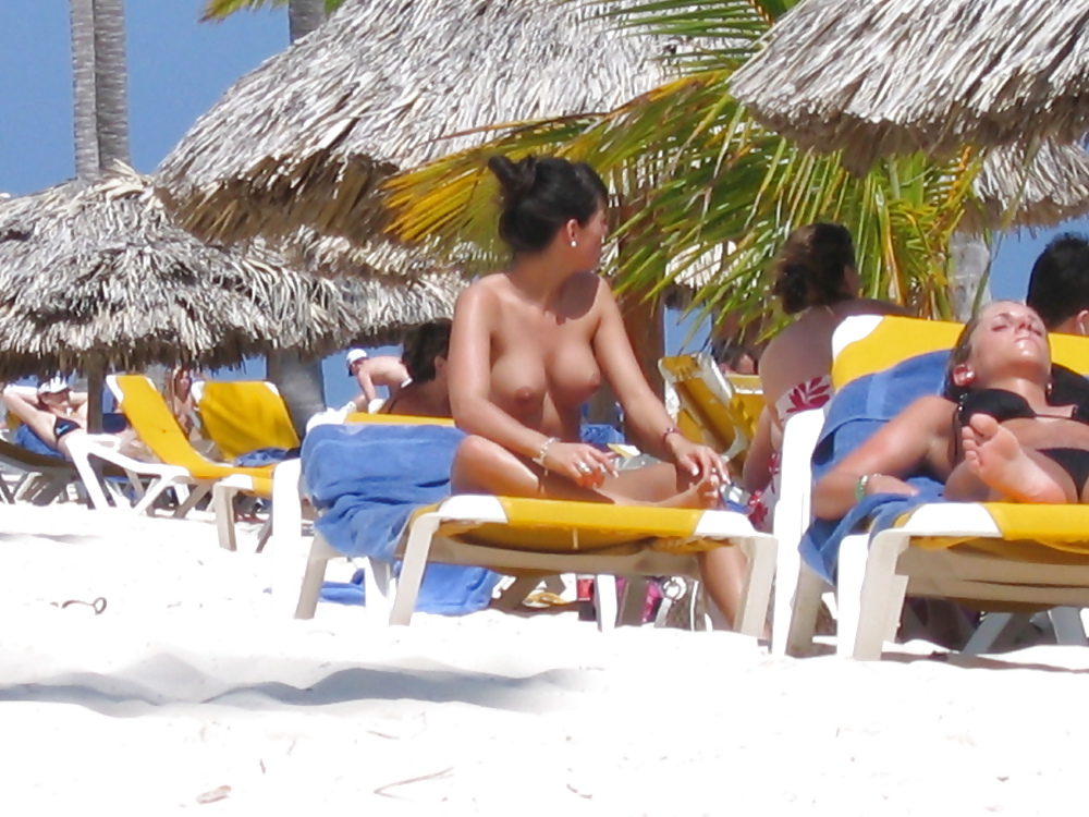 Topless women at the Beach #13260994