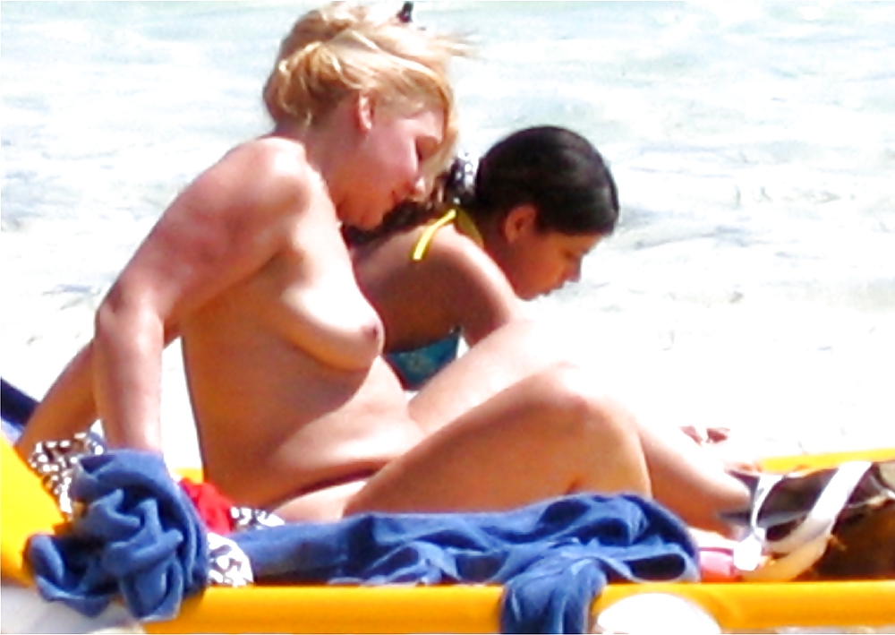 Topless women at the Beach #13261136