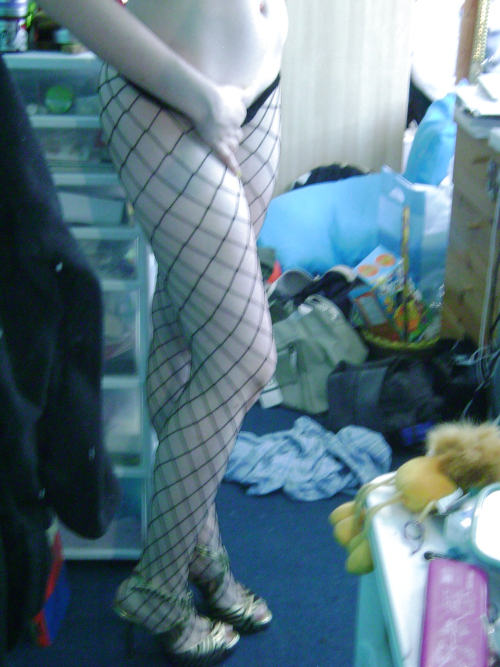 Girl wearing fishnet stockings #4592632