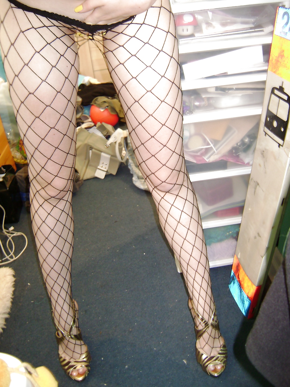 Girl wearing fishnet stockings #4592727