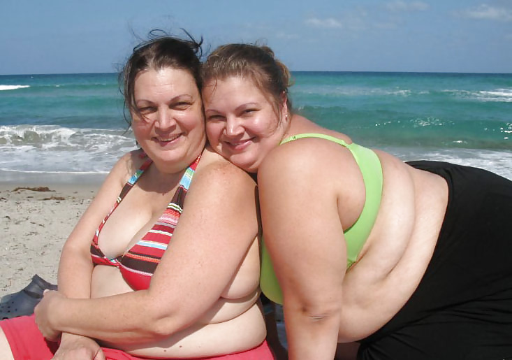 Mom and daughter's friend at beach #4343282