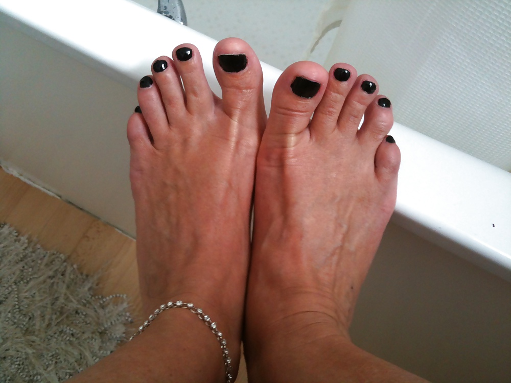 Freshly painted sunless toe nails #9414116