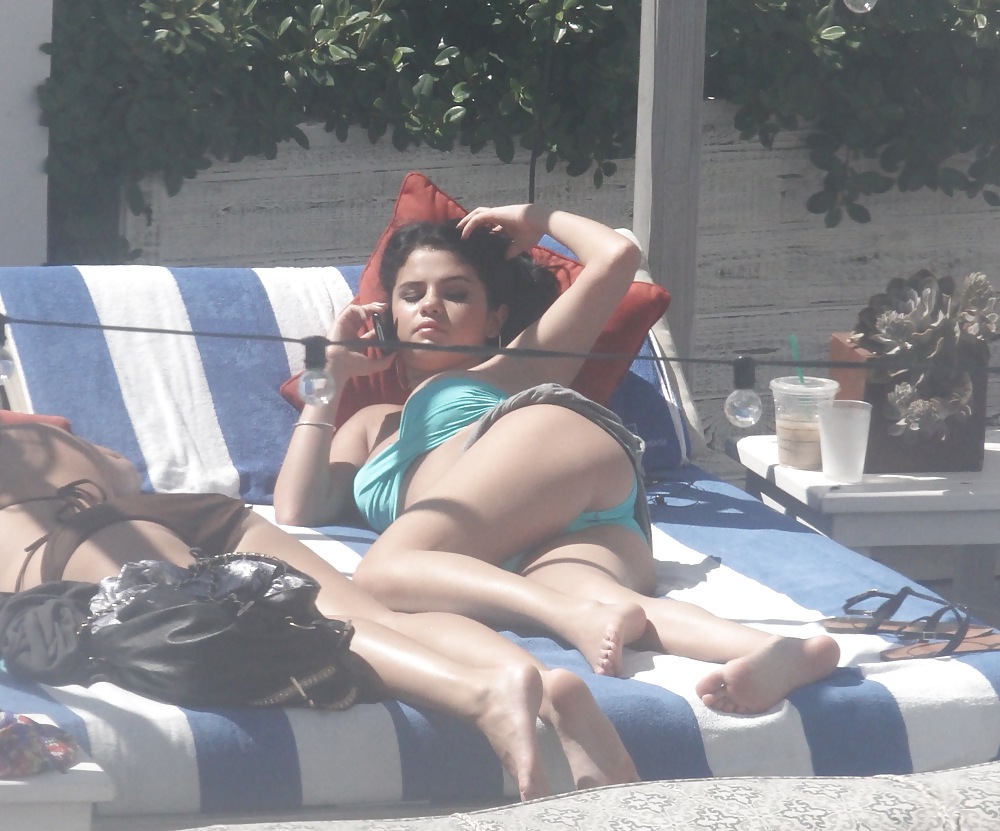 Selena Gomez Bikini At Pool In Miami Sep 17 2012  #13870397