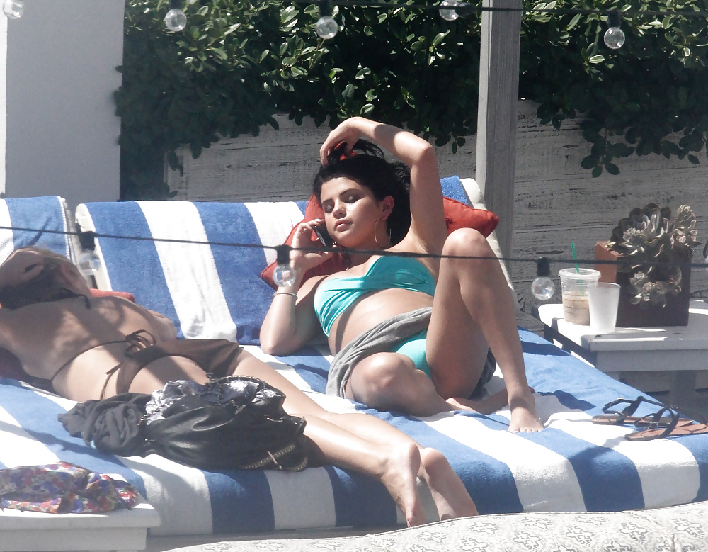 Selena Gomez Bikini At Pool In Miami Sep 17 2012  #13870432