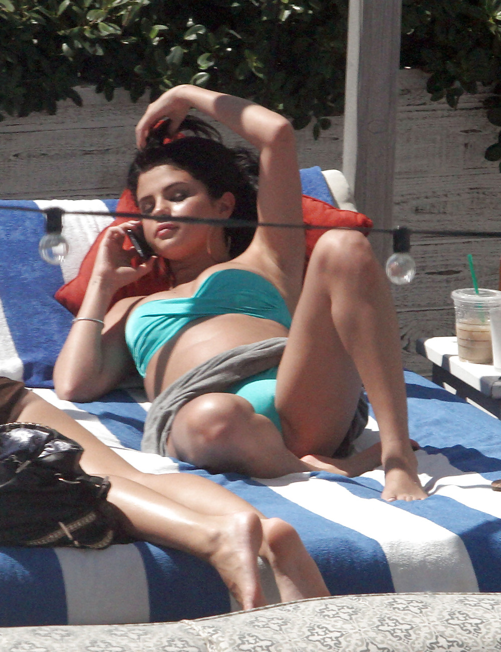 Selena Gomez Bikini At Pool In Miami Sep 17 2012  #13870441